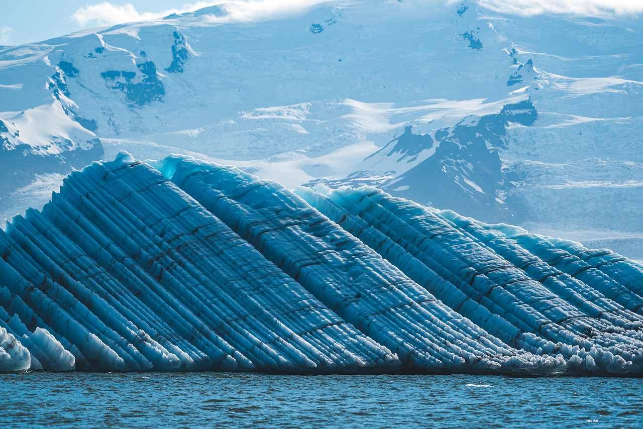 Crystal blue ice formations inside a glacier